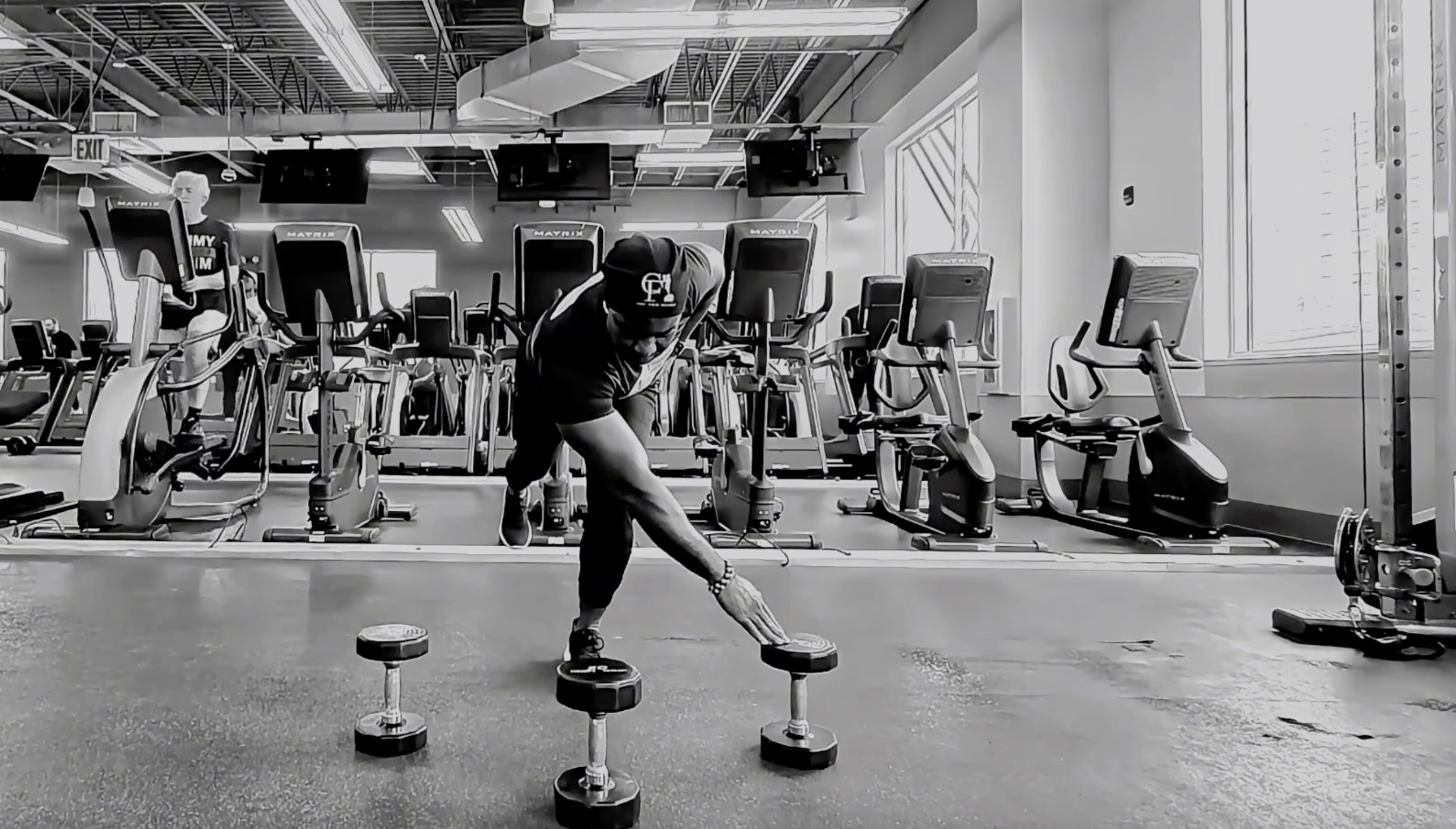Nickolas Thomas performing a functional strength movement